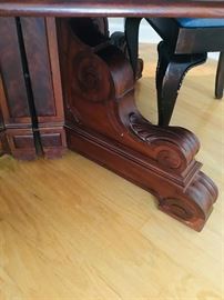 The carved legs on the mahogany antique table. One beautiful piece.