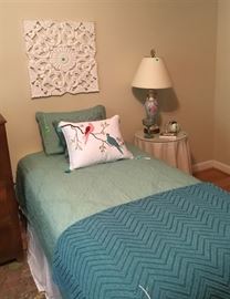 A close-up of one of the twin beds.