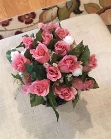 A lovely flower arrangement in black vase.