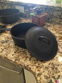 The deep cast iron fryer with lid.