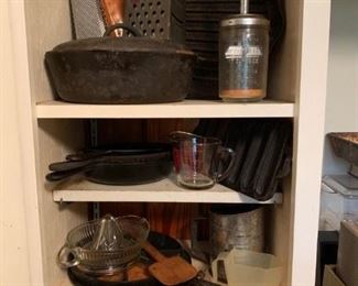 lots of cast iron and other vintage kitchen items
