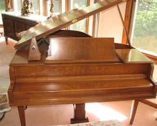 Chickering baby grand piano in pristine condition