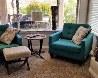 Great accent chairs and side tables along with an ottoman that can serve as a table too.
