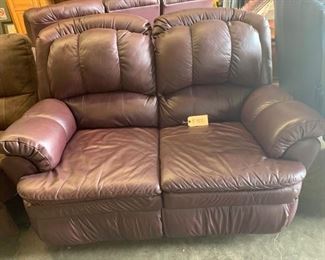 Lane Burgandy Love Seat with two recliners.              63"w x 40"d x 41"t.       Great Condition $300.               Also have matching sofa.