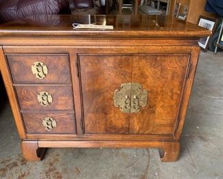 Thomasville 3 drawer oriental chest. Solid Hardwoods with olive ash burl inlay top. Brass Oriental hardware.  Very Good Condition $125