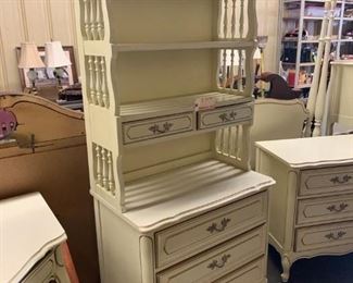 Henry Link Bedroom. Three drawer chest with 2 drawer matching bookshelf. Cream with gold trim.   30.5"w x 19"d x 73t".      Laminate top.                                    Very good condition   $75.                                                         Also have matching desk, dresser, mirror, chest with bookshelves, canopy bed and nightstands.