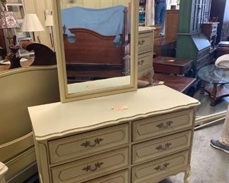 Henry Link 6 drawer double dresser. Cream with gold trim. Laminate top. Matching mirror.  46.5"w x 19"d x 30"t     Very good condition    $100.                                     Also have matching desk, chest with bookshelves nightstands and canopy bed.