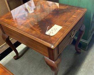 Thomasville end table. Solid mahogany with crotch mahogany veneer top. One drawer.                                    21"w x 25"d x 23.5"t       Very good condition    $50