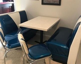 Old diner table with 2 benches and two chairs