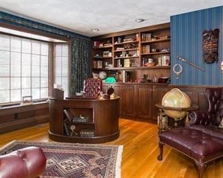 Gorgeous office filled with chesterfield style leather furniture!