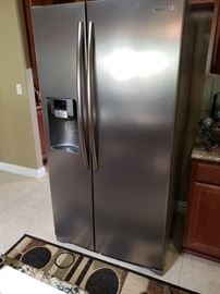 Nice Samsung Refrigerator. NOTE- You will have to take doors off to remove so be prepared. Well worth the effort .
