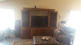 Beautiful Entertainment Center that can accommodate up to a 70 inch T.V.