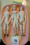 3 dolls, 1 male, 2 female. Cloth bodies Bisque heads, lower arms, lower legs