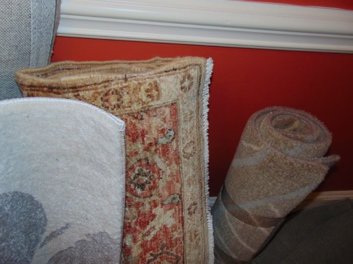 Row of rugs as you enter the house.  Most are 9 X 12