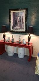 Chinese red table, lamps, framed vintage print
