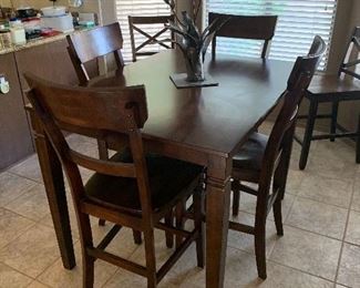 Bar height dining table and 6 upholstered chairs
