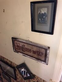 Antique needlework and photographs.