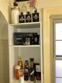 Upstairs bath items, perfume bottles.