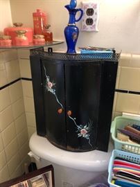 Black metal wall storage (has matching items, too).