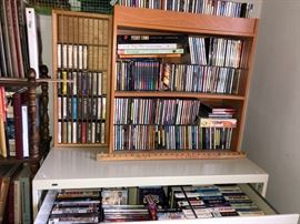 Drawers of cd's, dvd's and VHS tapes.  