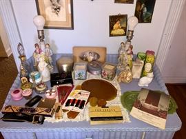 Pair of romantic porcelain lamps, perfumes, candles and hair items.