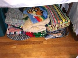 Colorful rag rugs and hand hooked rugs.