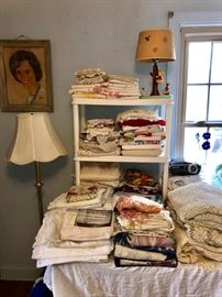 Winnie the Pooh lamp, drapery panels & lace window panels, and tablecloths.