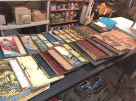 A table full of scrapbooks.