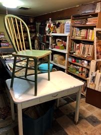 Enamel top table and wooden chair.