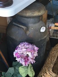 Antique metal milk jug