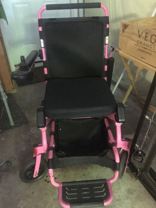 motorized wheelchair, used once, and more handicap items available.
