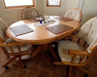 KITCHEN/DINING TABLE AND FOUR CHAIRS.