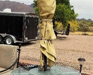 UMBRELLAS AND OUTDOOR TABLE FOR SALE.