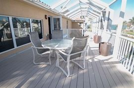 Tropitone patio furniture.