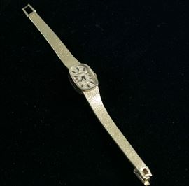 14K yellow gold. Longines watch.