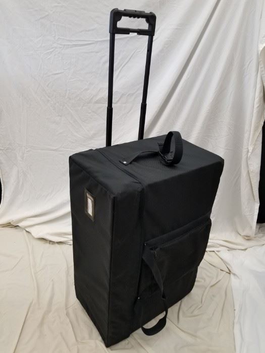 Rolling hard case. Foam Interior. Approximate dimensions are 33.5" W X 13" D X 21.5" H.  Great for transport and shipping of tools, firearms, instruments, or anything that needs to be protected. Add or remove foam inserts to customize for yourself.