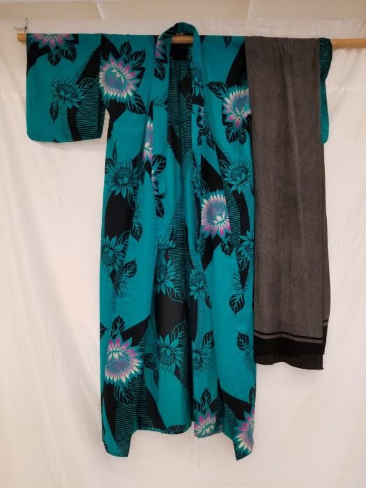 Beautifully colored, authentic silk, Japanese kimono with sash. This is another kimono, that according to the estate owner, was brought to the U.S. in 1953 by a WWII bride from Japan. See Lots 17 and 51B for additional kimonos that were brought over by the same owner.
