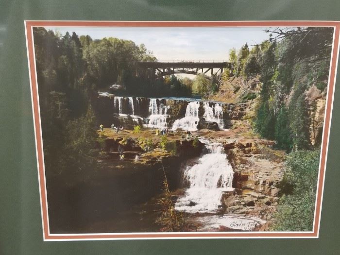 Commissioned, Original, Hand-Colored Photograph of Gooseberry Falls on Minnesota's North Shore, by nationally renowned artist, Gladys Teig. Gladys Teig won many national awards for her photo re-touch work. This gorgeous piece comes with the the original black and white "glossy guide", along with a description of what was used to create this signed and dated piece of art.  Framed size is 22" W X 19" H.