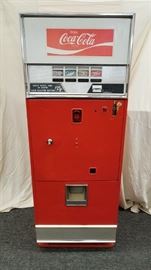 Vintage, circa 1960's, Westinghouse Coca-Cola Machine. This Coke machine has all original components except for a new coin mechanism. This rare, 4-button machine was designed for bottles and has cabinet model #: WB78-B4. It has 2 double slots and 2 single slots to accommodate 4 different flavors. The "78" in the model indicates it should hold 78 bottles. Powers on. Seems to blow cool to cold air. Has key. SEE VIDEOS! Please inspect to determine complete condition as we weren't able to test dispensing bottles. Please bring appropriate help and/or dolly for removal, as this machine is heavy. Dimensions are 24" W X 22" D X 64" H.