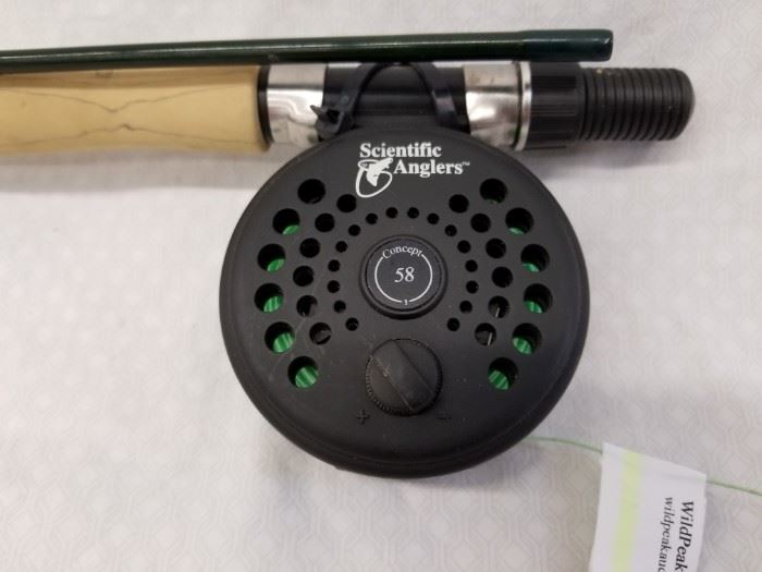 Scientific Anglers graphite fly fishing rod and Concept 58 fly reel. Designed for trout or panfish. 8'6" length and a 5/6 WT. Please see lots 65, 72, 82, 88, and 100 for additional fishing gear.