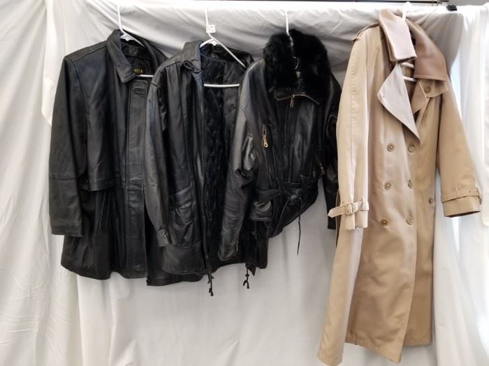 Quality vintage clothes include (3) leather jackets and trench coat. Jessica Ferrar genuine leather coat. Misty Harbor trench coat with 80% wool/20% nylon interior and 85% polyester/15% cotton exterior. Synergy leathers genuine leather coat. Komitor genuine leather coat. See pictures for sizes.