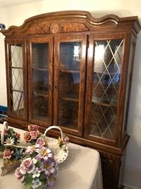 China cabinet .  Flowers not for sale