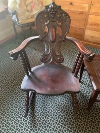 Possibly one of a kind! Hubbard & Eldridge Co...Rochester, N.Y. hand carved Gargoyle rocker with spindle legs.  