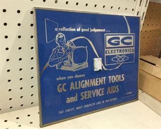 Vintage GC Electronics sign with mirror on reverse.