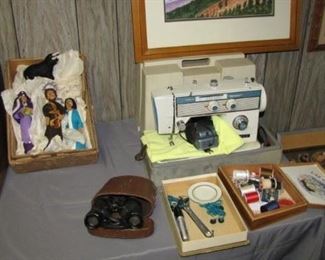 Sewing machine, vintage binoculars, dolls, Bausch & Lomb microscope and case. 