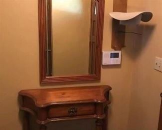 Entry table and mirror