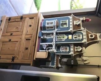 One of a kind Doll house! mounted on pine cabinet and swivel base