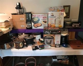 Many nice kitchen appliances, many still in boxes