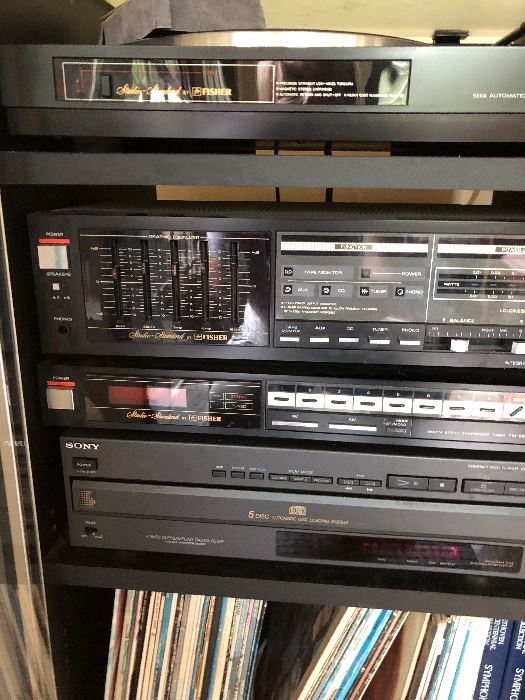 Fisher and sony components in a Fisher stereo synthesizer, receiver and turntable all in a specially made cabinet asking $120 for the components and the cabinet