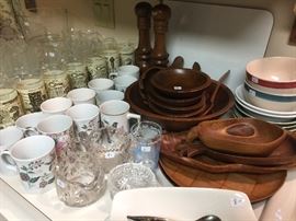 Teak serving pieces and more bar glasses.